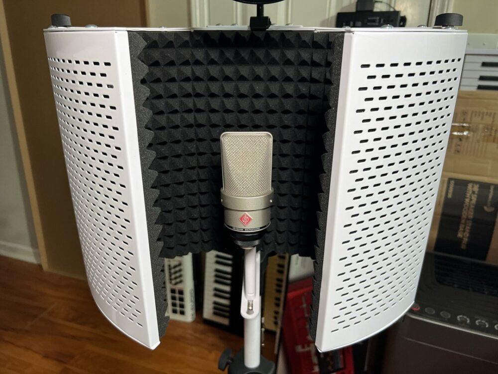 Neumann TLM103 Microphone – For crystal-clear vocals.